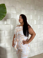 MACACÃO BRANCO COM LARANJA | PLUS